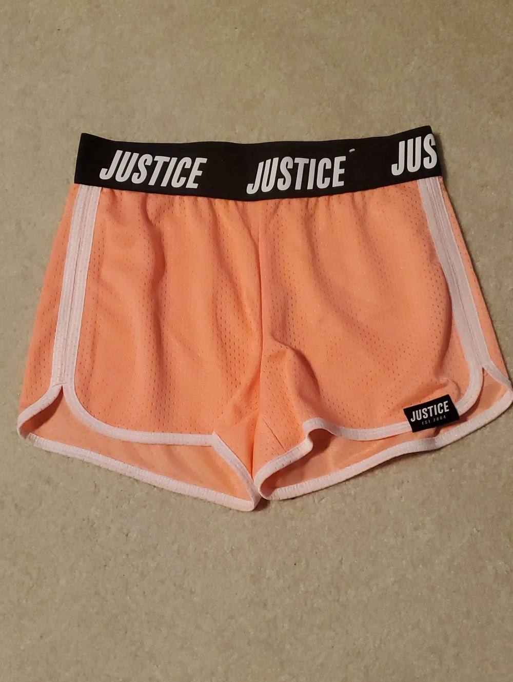 Justice Peach Athletic Mesh Shorts with Black Branded Waistband